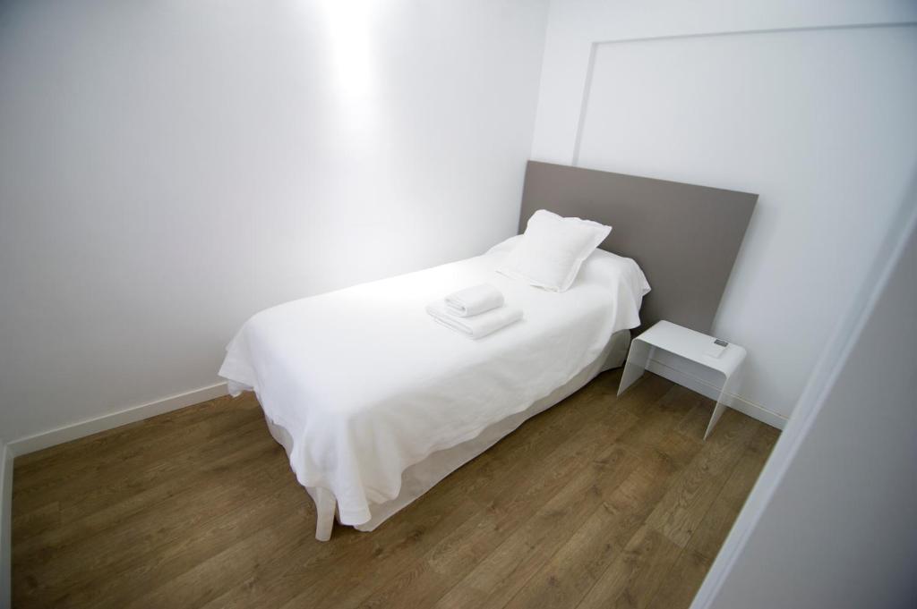 Postel nebo postele na pokoji v ubytování Smart Suites Albaicin