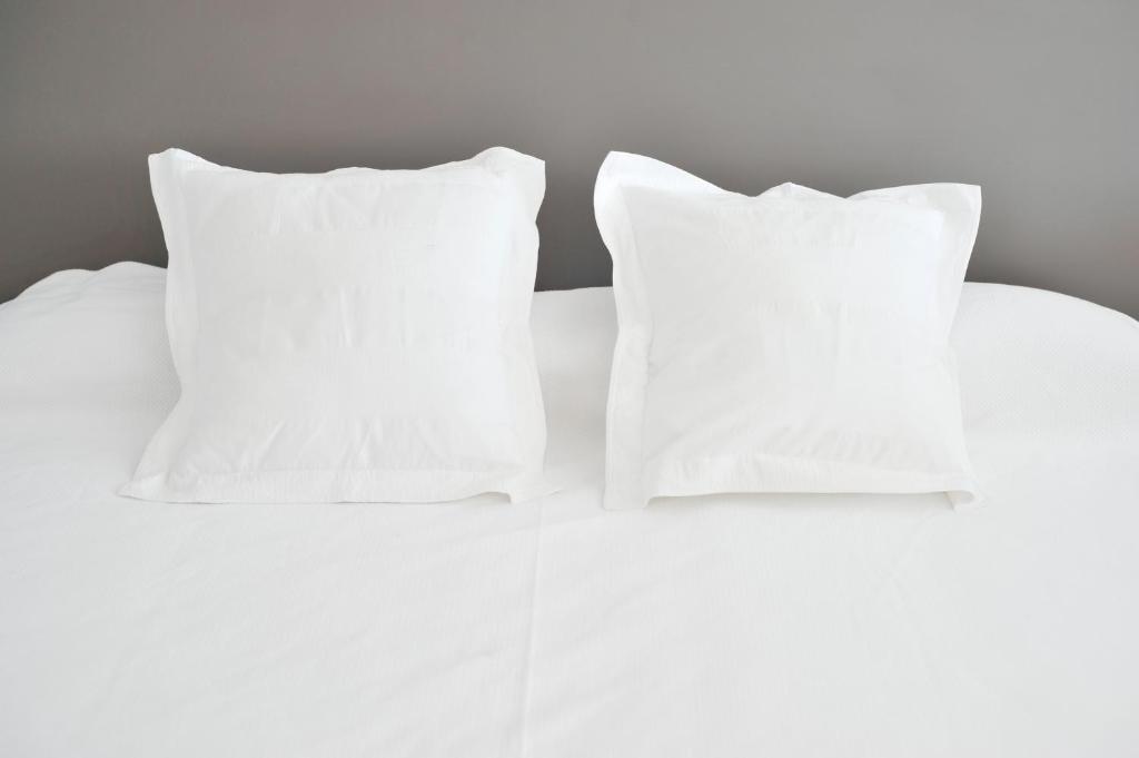 Postel nebo postele na pokoji v ubytování Smart Suites Albaicin