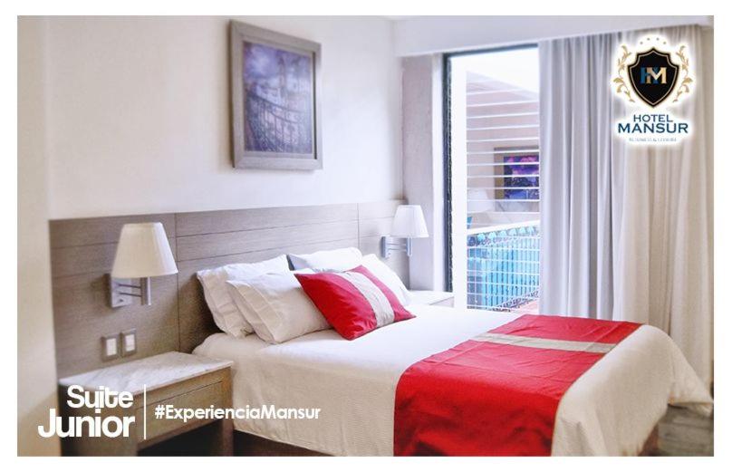 Postel nebo postele na pokoji v ubytování Hotel Mansur Business & Leisure