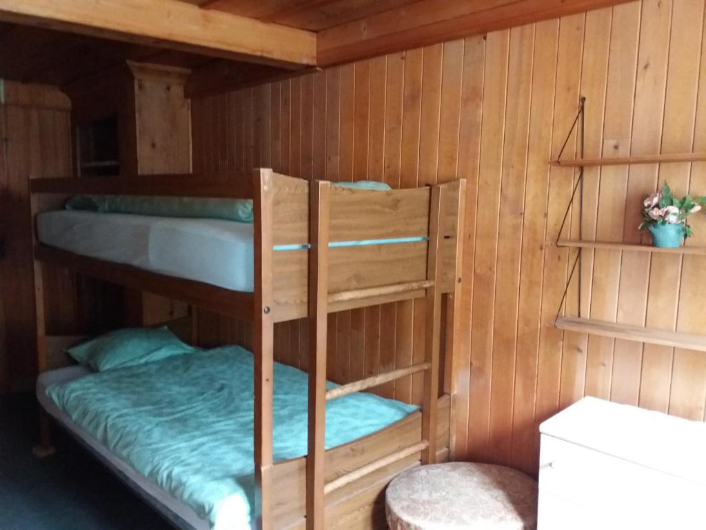 Postel nebo postele na pokoji v ubytování Hôtel du Chamois