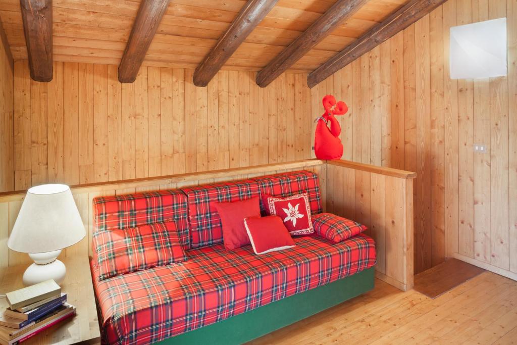 Postel nebo postele na pokoji v ubytování Albergo Diffuso Sauris in Sauris Di Sopra