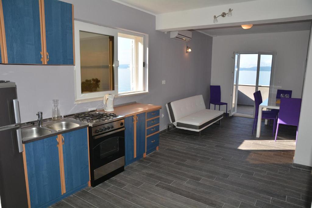 Kuchyňa alebo kuchynka v ubytovaní Apartments Dubas