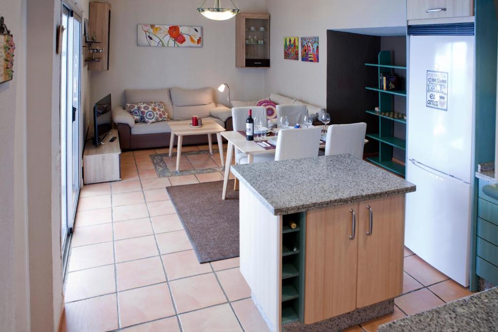 A kitchen or kitchenette at Beachfront apartment in paradise