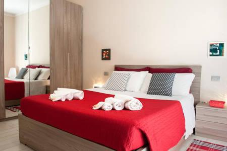 Postel nebo postele na pokoji v ubytování Apartment Home Marconi25