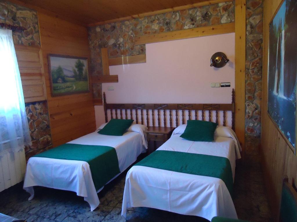 Postel nebo postele na pokoji v ubytování Picon del Conde