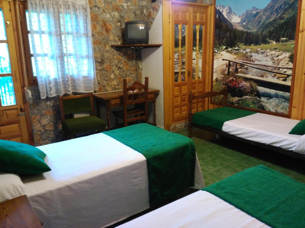 Postel nebo postele na pokoji v ubytování Picon del Conde