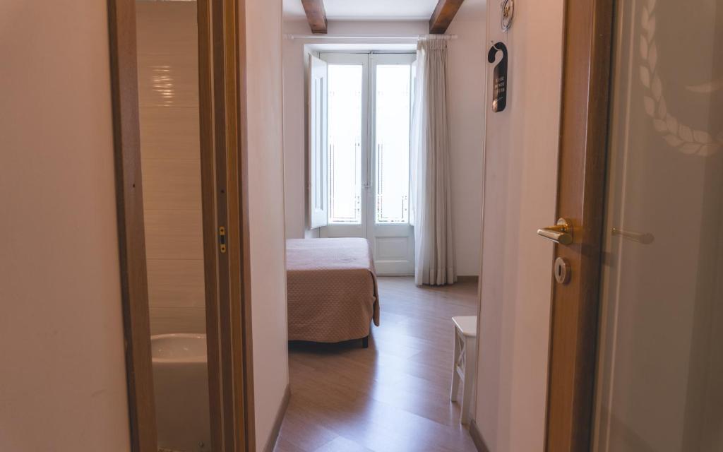 Postel nebo postele na pokoji v ubytování Fata34 Luxury B&B