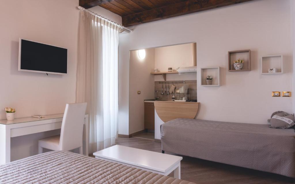 Postel nebo postele na pokoji v ubytování Fata34 Luxury B&B