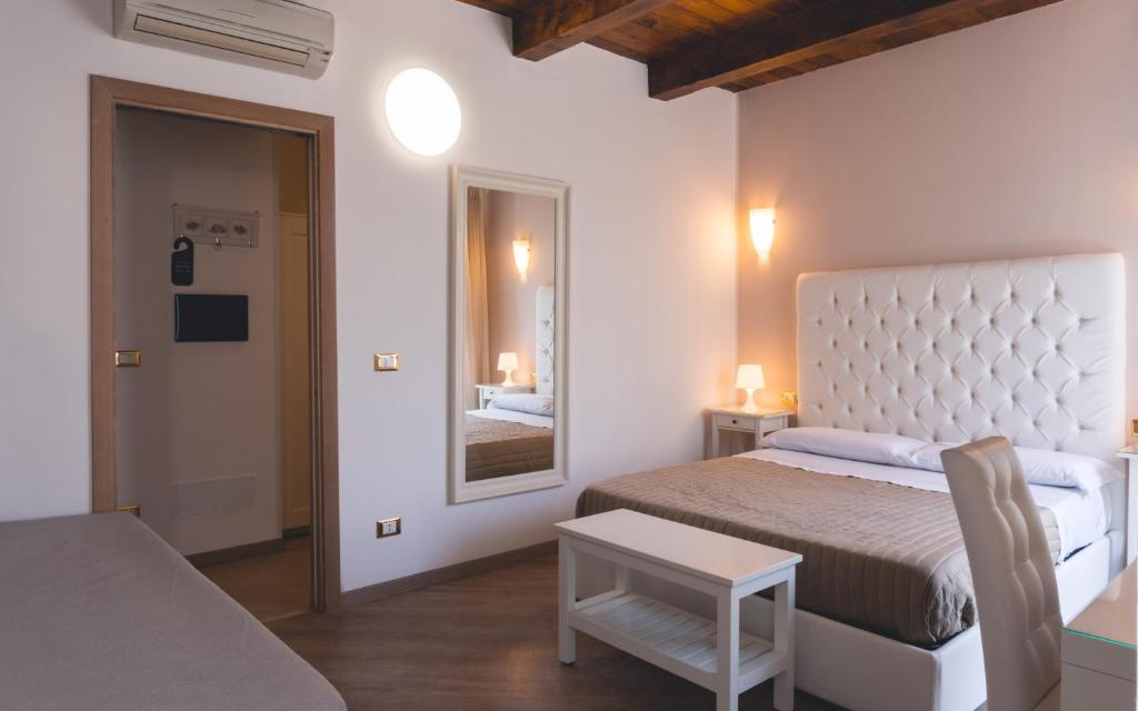Postel nebo postele na pokoji v ubytování Fata34 Luxury B&B