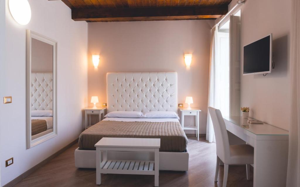 Postel nebo postele na pokoji v ubytování Fata34 Luxury B&B