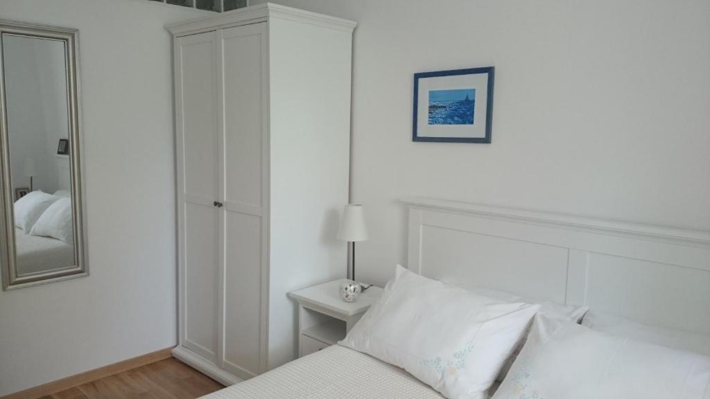 Postel nebo postele na pokoji v ubytování Apartments Ruzica