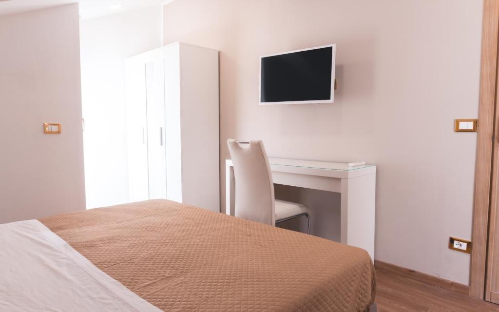 TV a/nebo společenská místnost v ubytování Fata34 Luxury B&B