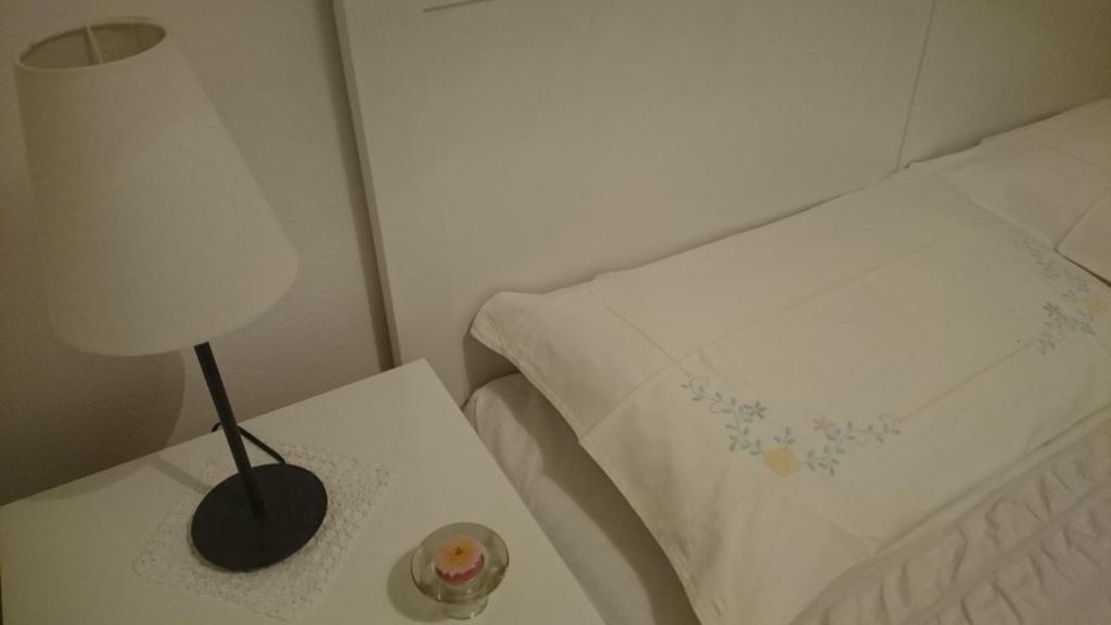 Postel nebo postele na pokoji v ubytování Apartments Ruzica