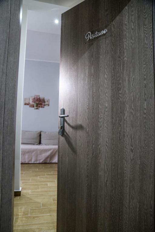 Posteľ alebo postele v izbe v ubytovaní B&B Caracciolo 109