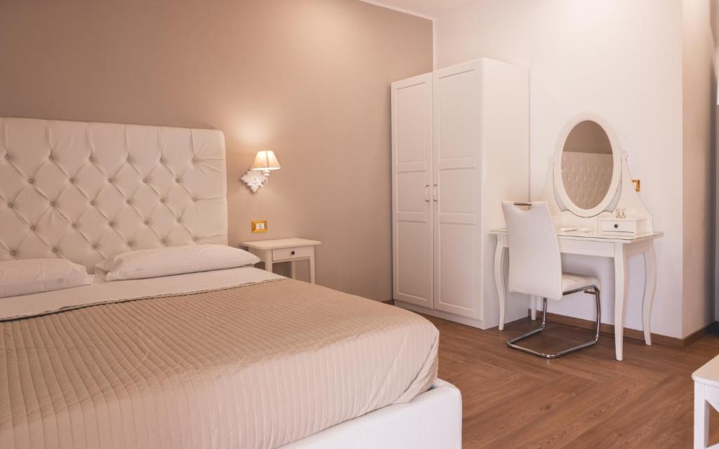 Postel nebo postele na pokoji v ubytování Fata34 Luxury B&B