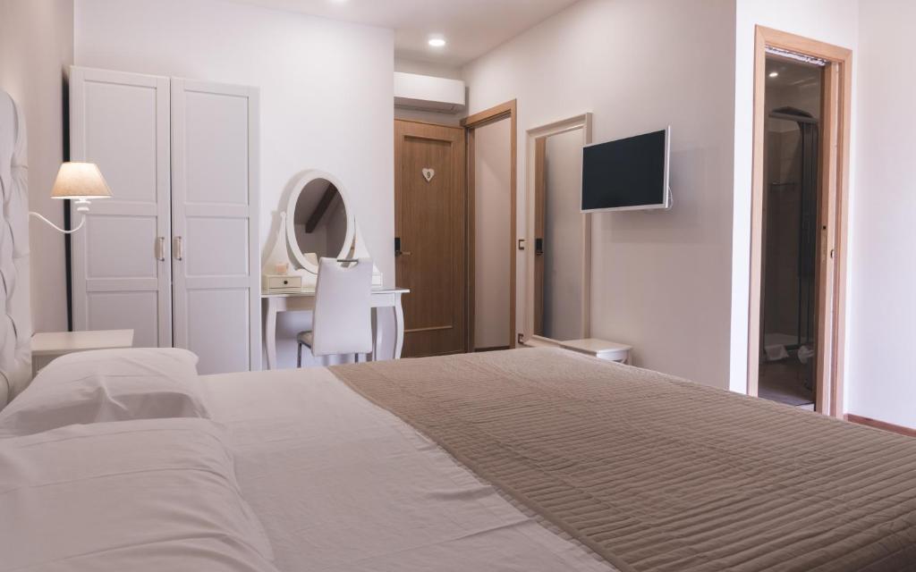 Postel nebo postele na pokoji v ubytování Fata34 Luxury B&B