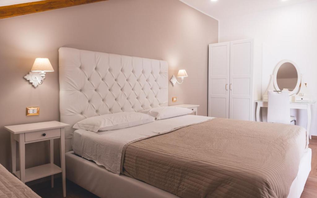 Postel nebo postele na pokoji v ubytování Fata34 Luxury B&B
