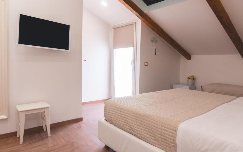 Postel nebo postele na pokoji v ubytování Fata34 Luxury B&B