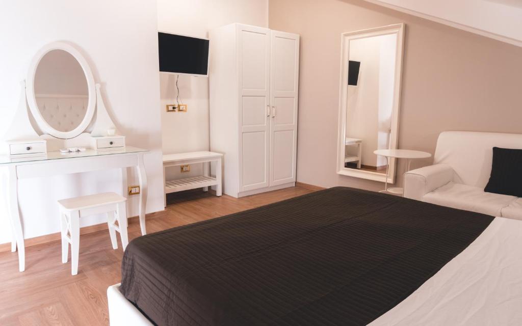 Postel nebo postele na pokoji v ubytování Fata34 Luxury B&B
