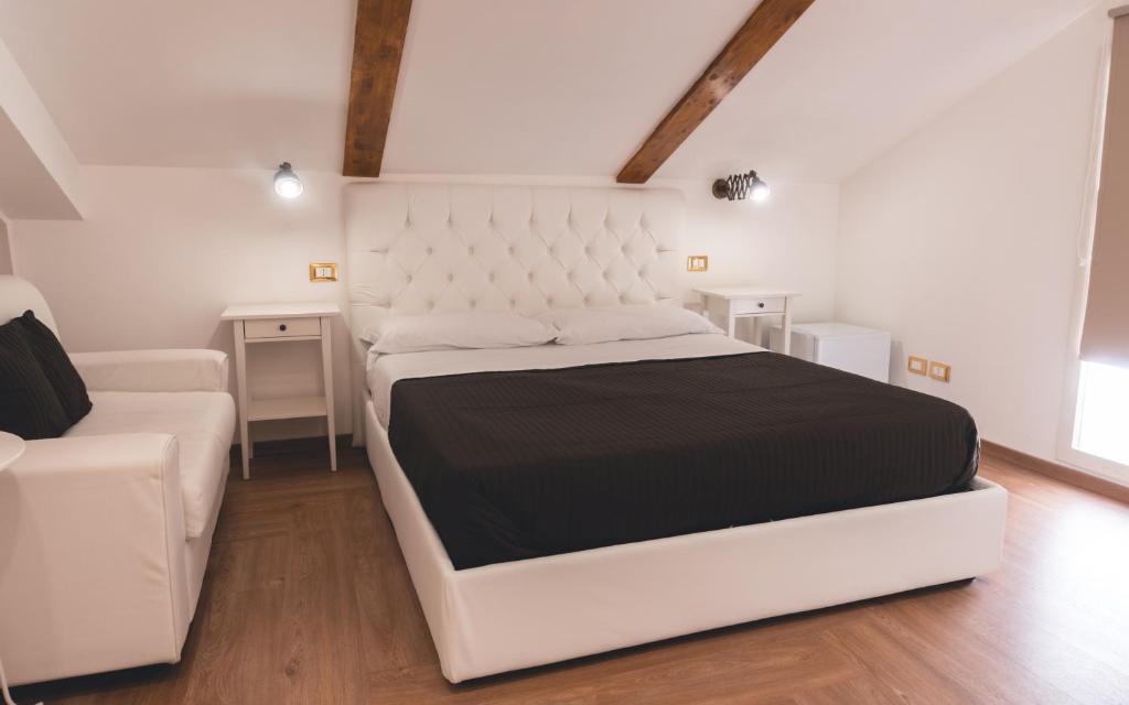 Postel nebo postele na pokoji v ubytování Fata34 Luxury B&B
