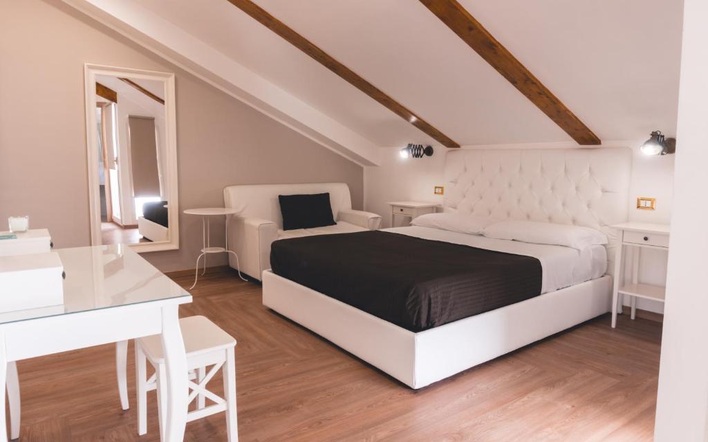 Postel nebo postele na pokoji v ubytování Fata34 Luxury B&B