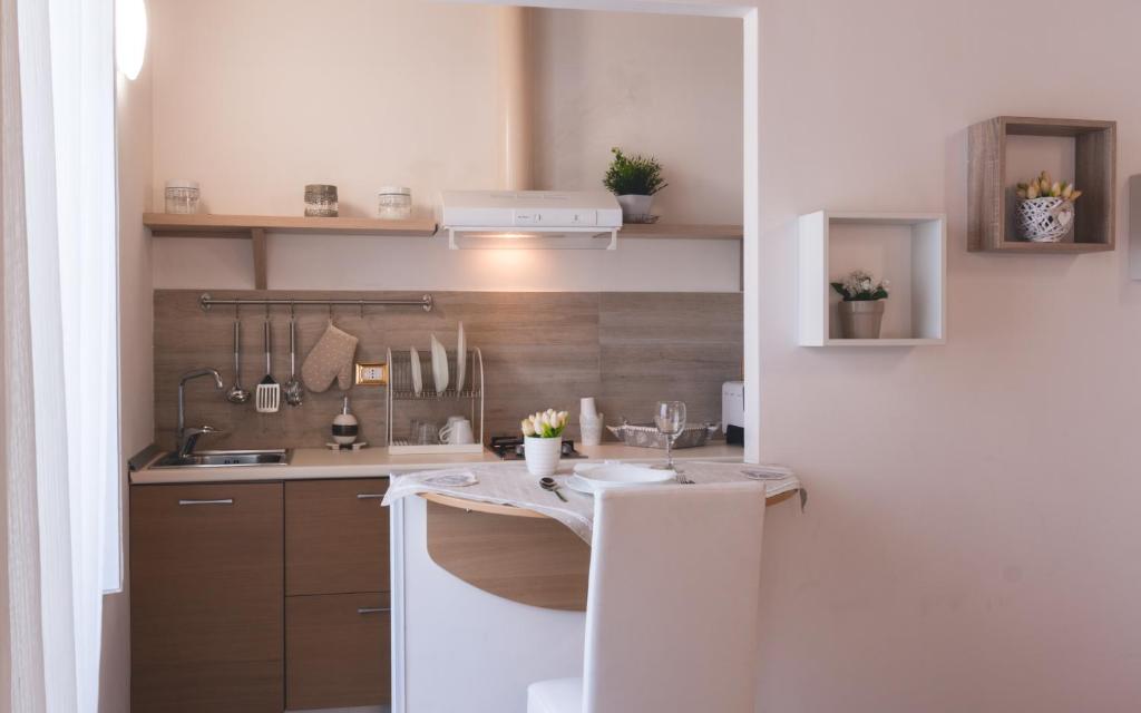 Kuchyň nebo kuchyňský kout v ubytování Fata34 Luxury B&B