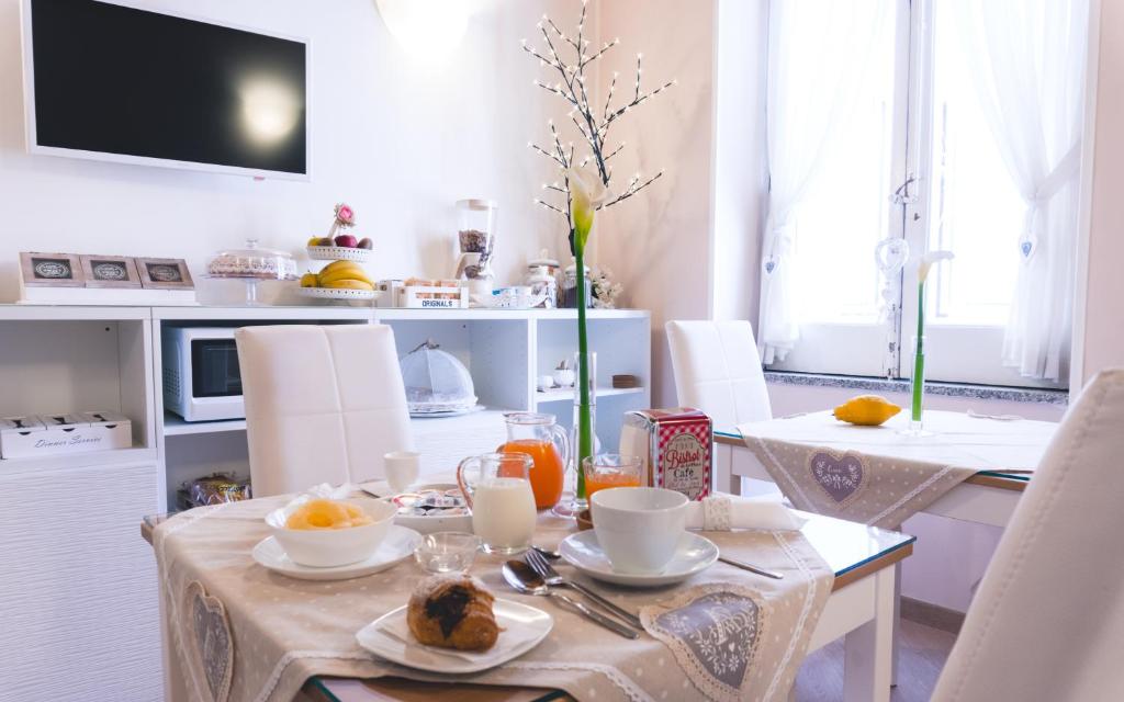 TV a/nebo společenská místnost v ubytování Fata34 Luxury B&B