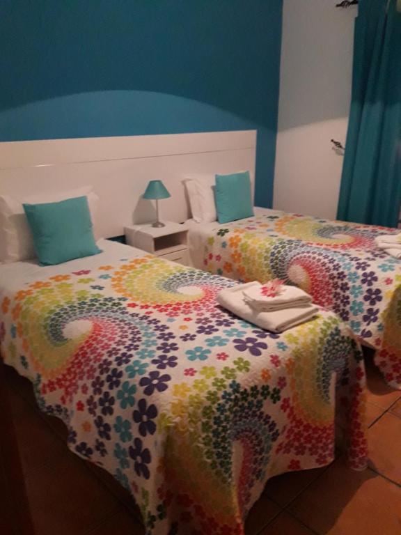 A bed or beds in a room at Apartamento Alagoinha