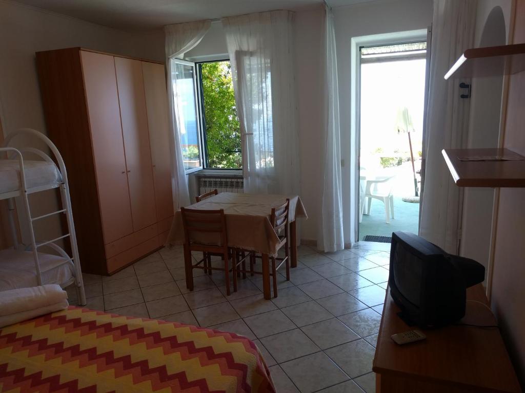 Cama ou camas em um quarto em Residence Giardino del Sole