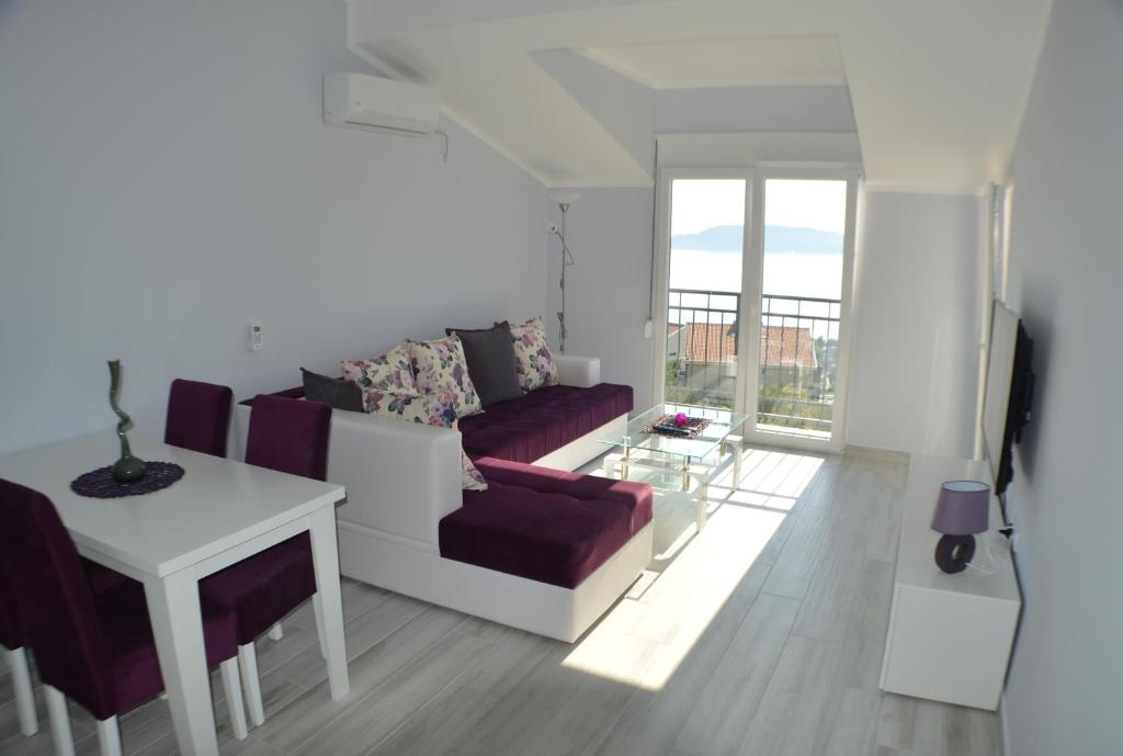 TV a/nebo společenská místnost v ubytování Apartments MM