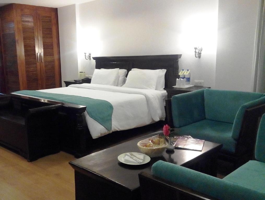 Postel nebo postele na pokoji v ubytování Manuallaya The Resort & Spa