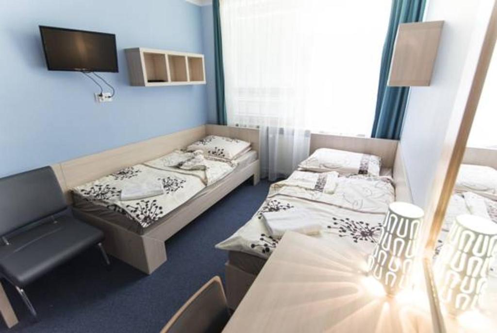 En eller flere senge i et værelse på Strumyk