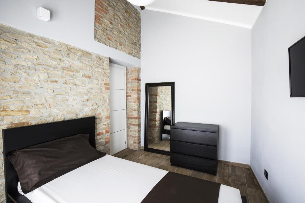 Postel nebo postele na pokoji v ubytování Villa Barbero Alba Langhe