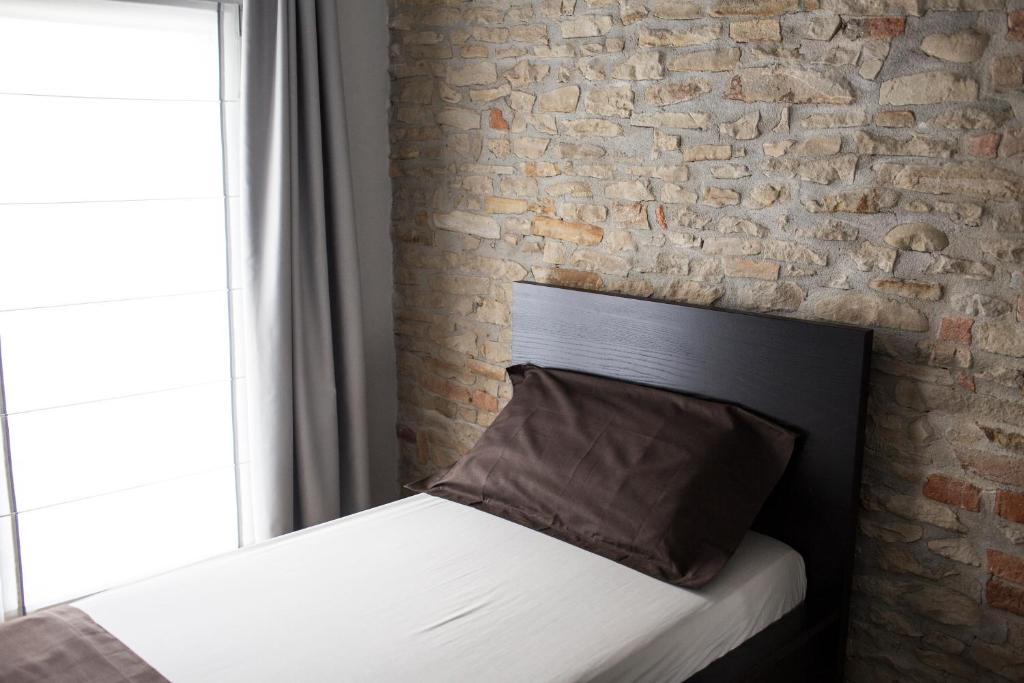 Postel nebo postele na pokoji v ubytování Villa Barbero Alba Langhe