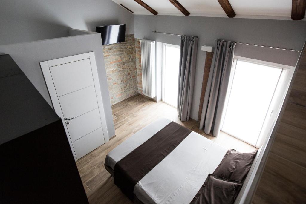 Postel nebo postele na pokoji v ubytování Villa Barbero Alba Langhe