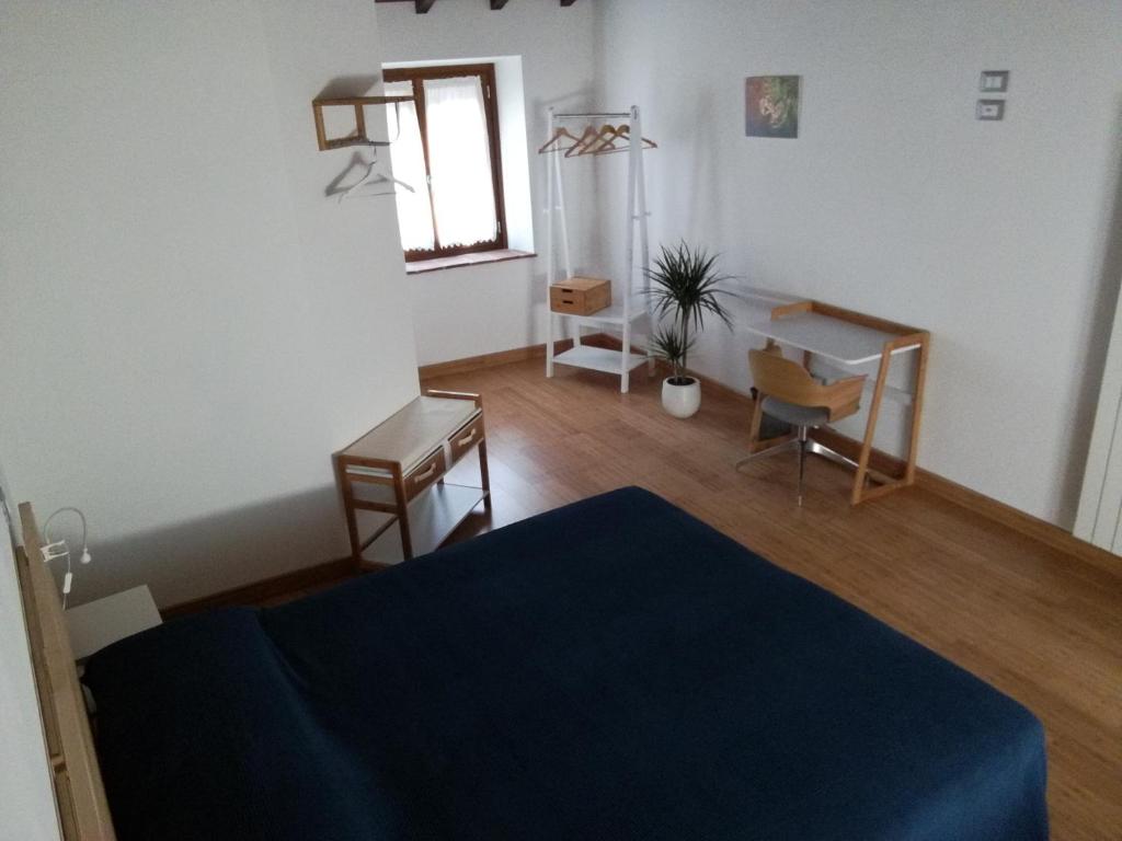 Postel nebo postele na pokoji v ubytování B & B Via di Mezzo