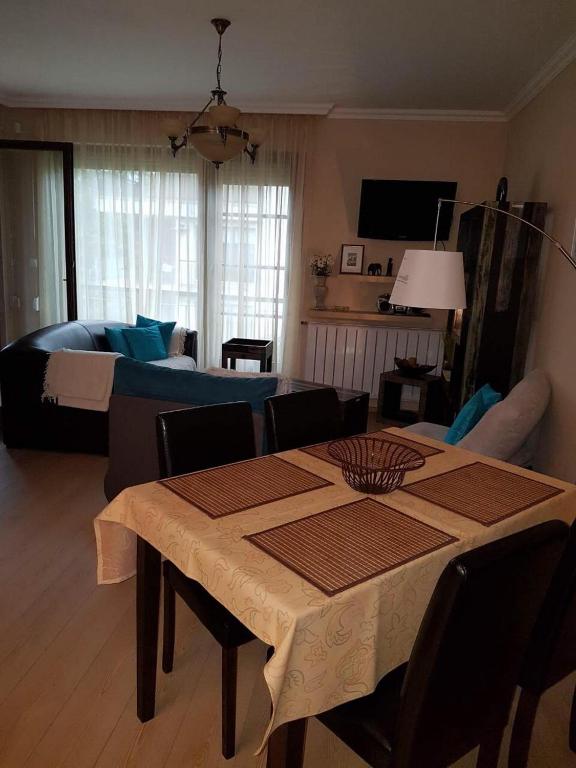 Televízia a/alebo spoločenská miestnosť v ubytovaní Zamardiresort