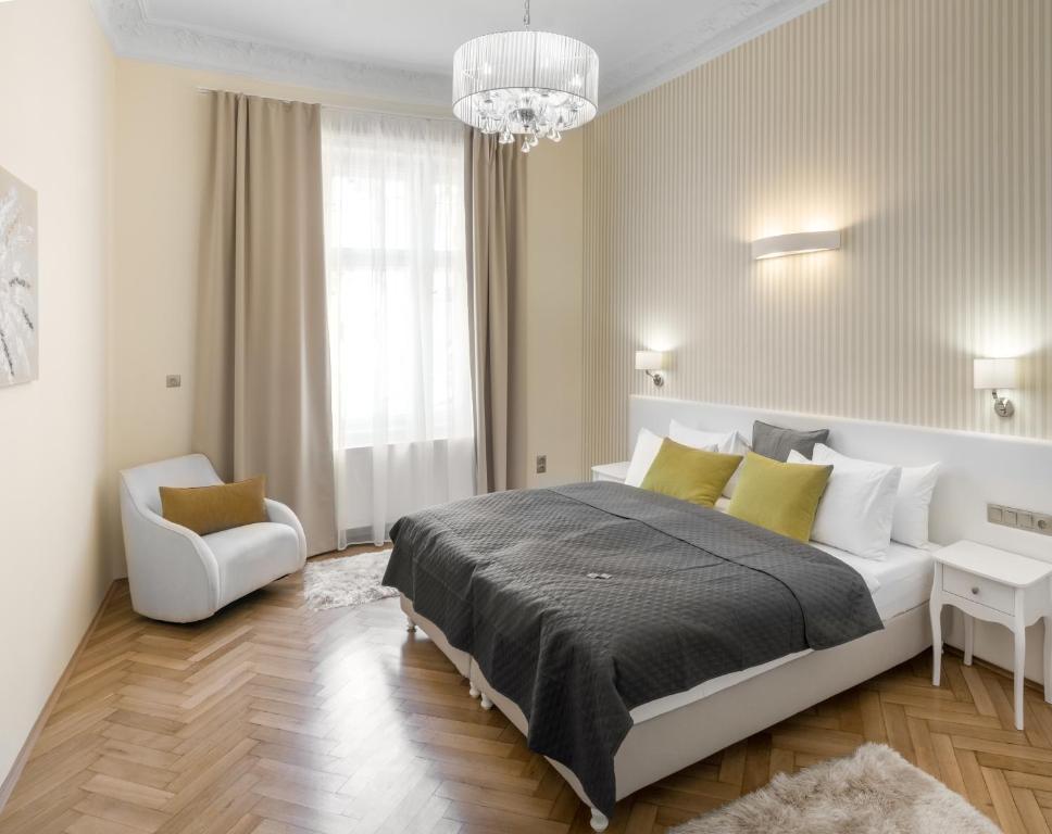 Łóżko lub łóżka w pokoju w obiekcie Mordecai 12 Apartments by Adrez