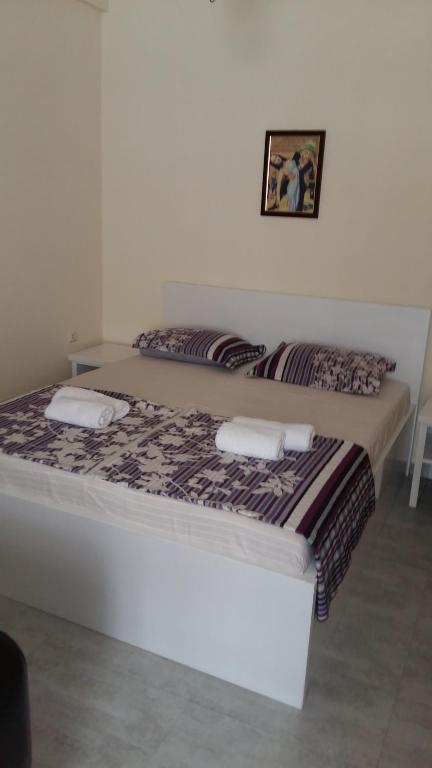 Postel nebo postele na pokoji v ubytování Guest House Kldiashvili