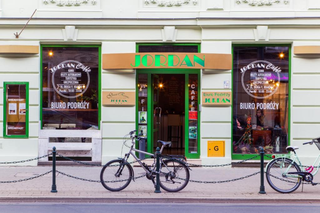 a bike parked in front of a store at Jordan Pokoje Gościnne in Krakow