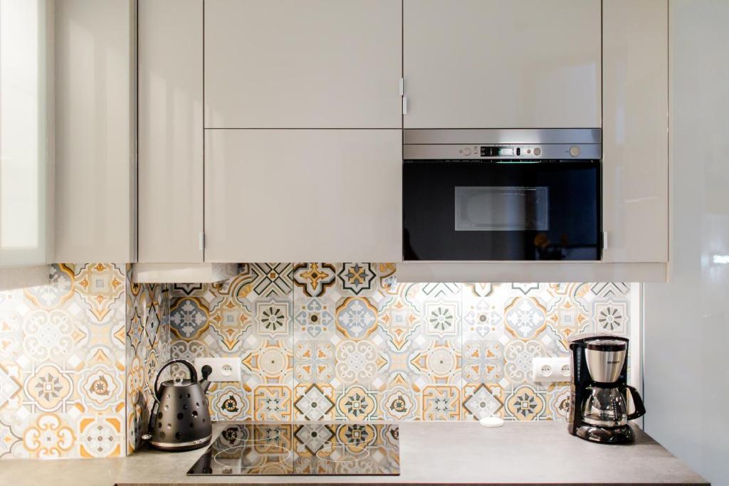 Kuchyňa alebo kuchynka v ubytovaní Kings Landing Apartament