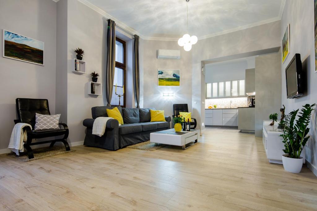 Posedenie v ubytovaní Kings Landing Apartament
