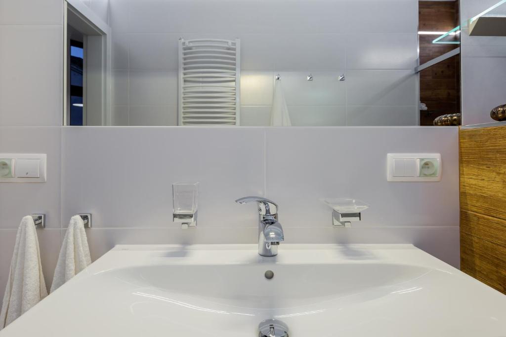 Kúpeľňa v ubytovaní Kings Landing Apartament