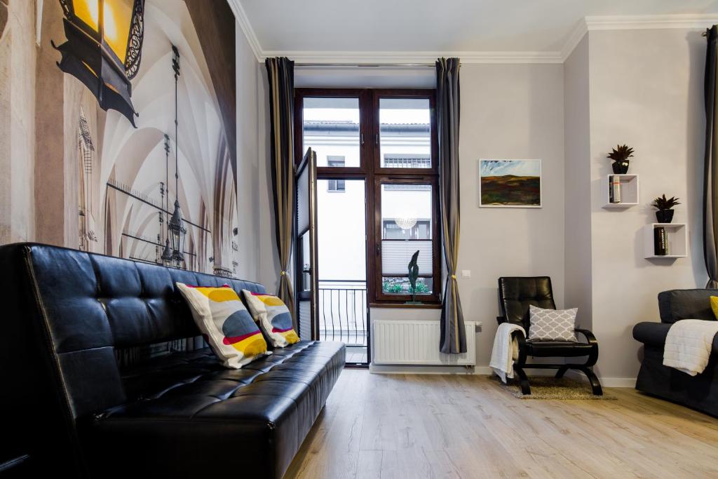 Posedenie v ubytovaní Kings Landing Apartament
