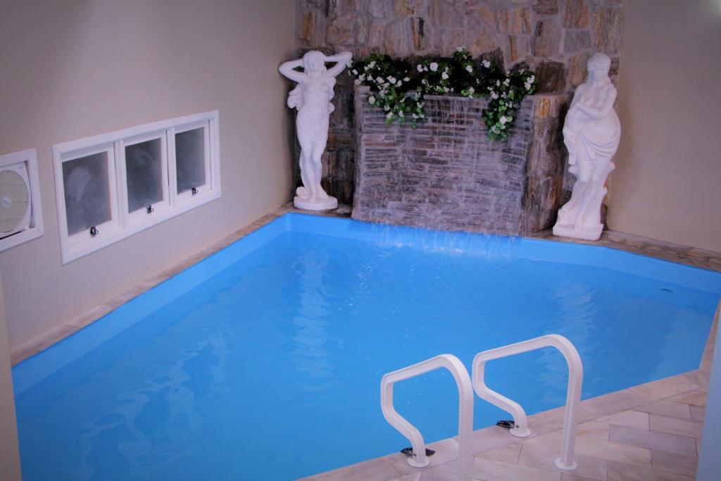 Bazén v ubytování Motel Avenida (Adult Only) nebo v jeho okolí