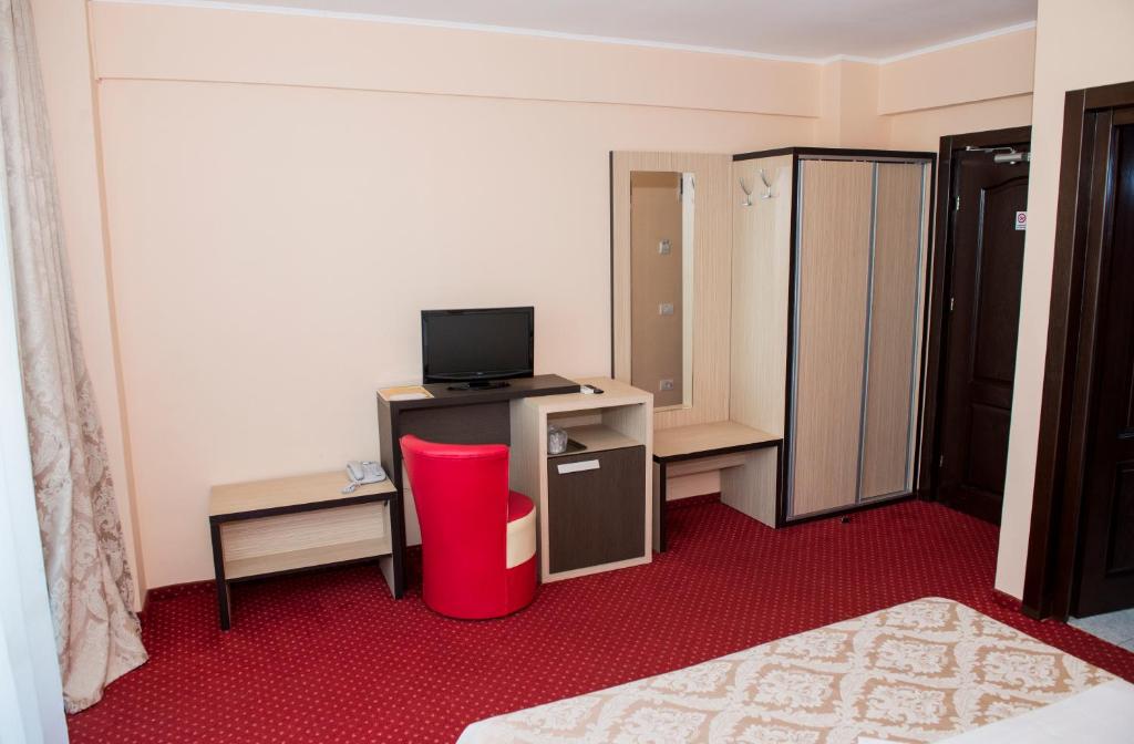 TV a/nebo společenská místnost v ubytování Hotel Romantic