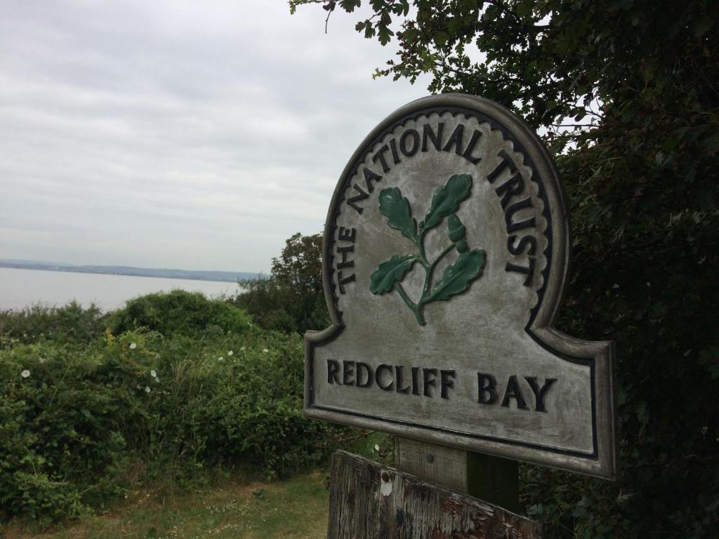 a sign for a red butterfly day at a red cliff bay at The Nook @ Drop Anchor in Portishead