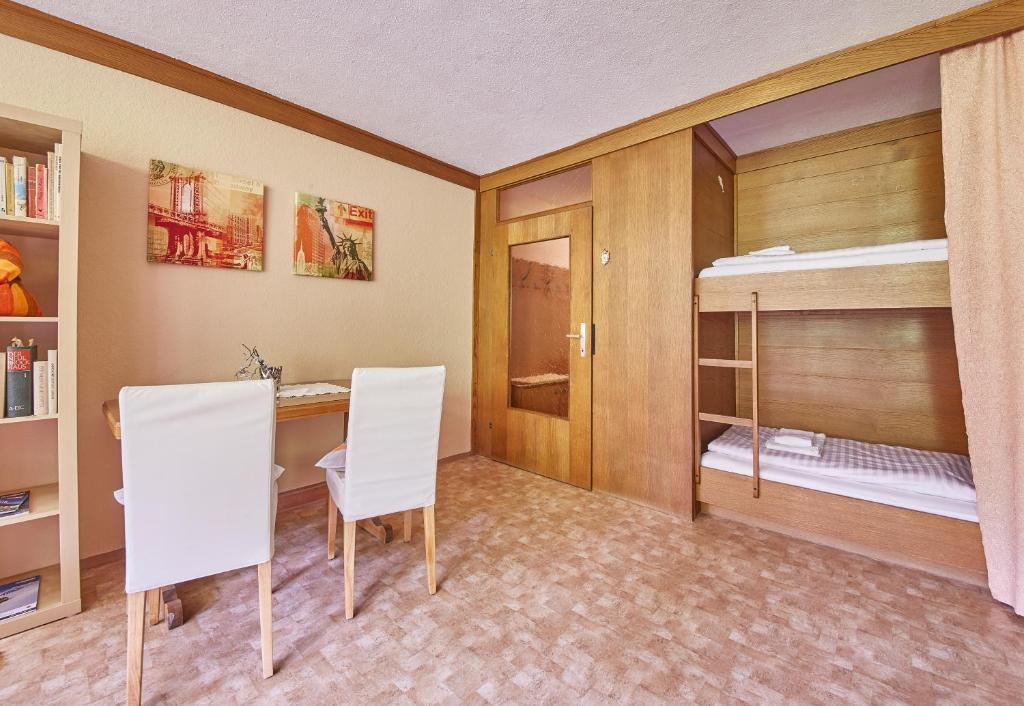 Postel nebo postele na pokoji v ubytování Appartements Alpin
