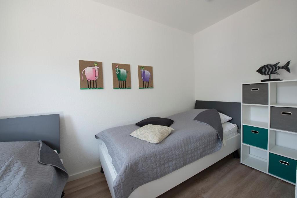 Postel nebo postele na pokoji v ubytování Ferienhaus Vermeer