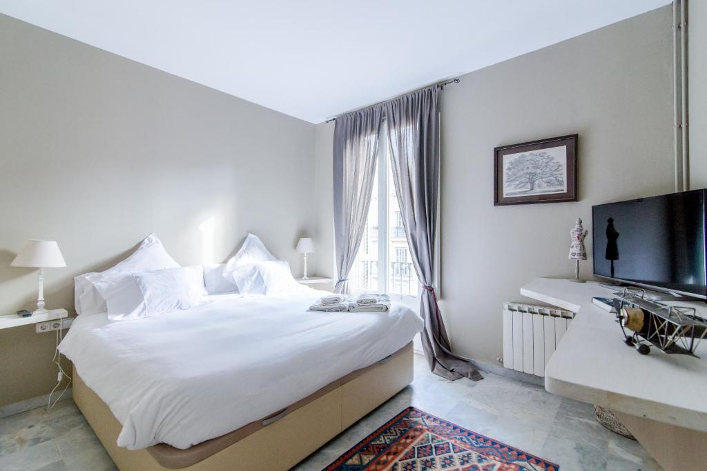 Postel nebo postele na pokoji v ubytování BCN Apartments 41